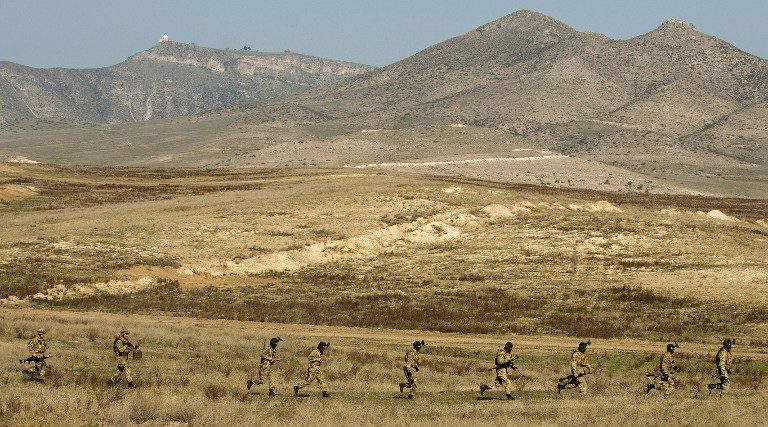 Azerbaijan, Armenia forces clash as Putin urges ceasefire