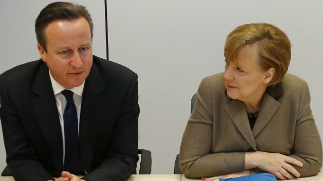 Merkel, Cameron in tough talks over top EU job