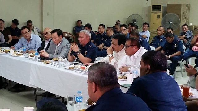 CRIME PREVENTION. Police Regional Office 3 director Chief Supt. Aaron Aquino assures Korean Embassy officials and officers of Korean communities in Central Luzon that the police are doing everything to cleanse it ranks and prevent crimes committed against Koreans. On Aquinoâs right is South Korean Consul Kim Dae Hee. Photo by Jun A. Malig/Rappler 