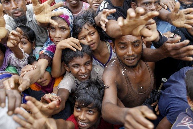 SEEKING HELP. In this file photo, Rohingya refugees from Myanmar's Rakhine state wait for aid at Kutupalong refugee camp in the Bangladeshi town of Teknaf on September 5, 2017. Photo by K M Asad/AFP  