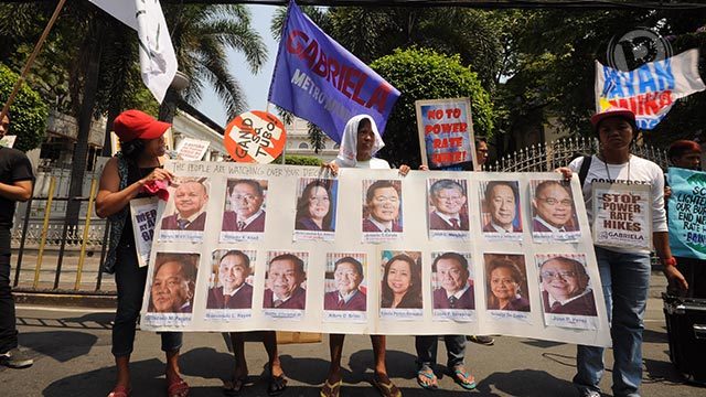 NO MORE PRICE HIKE. Protesters led by consumer group POWER! rally outside the Supreme Court in Manila, April 22. Photo by Jose Del/Rappler