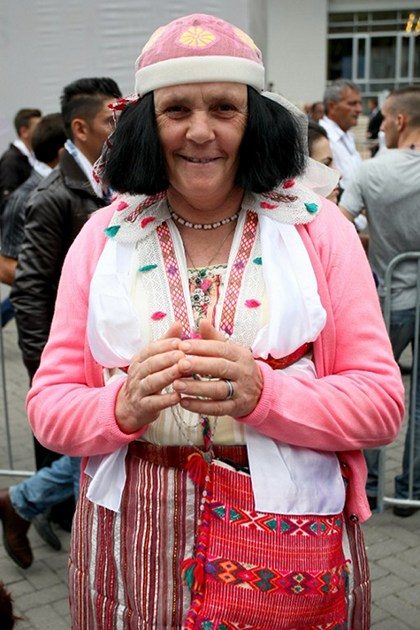 AWAITING FRANCIS. An Albanian woman wearing a traditional costume joins the crowd attending Pope Francis’ Mass in Tirana on September 21, 2014. File photo by Gent Shkullaku/AFP 