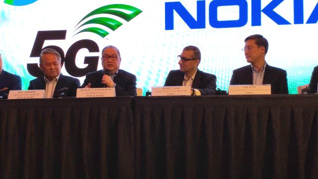 From left to right, PLDT's Eric Alberto, Manny Pangilinan and Nokia CEO Rajeev Suri and Nokia APAC VP Jae Won at the signing of their 5G memorandum of understanding, Tuesday, March 12. Photo by Gelo Gonzales/Rappler 