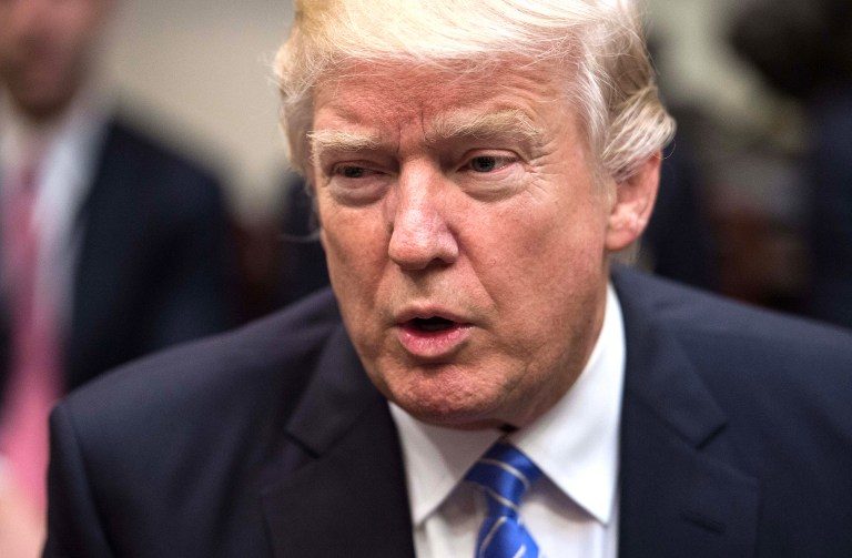 Trump signs sweeping tariffs, defying trade war warnings