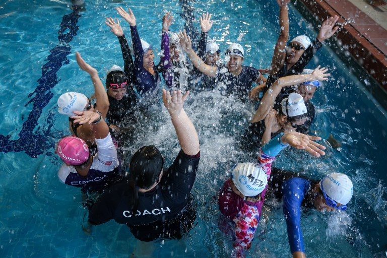 Hong Kong domestic helpers get free swimming lessons
