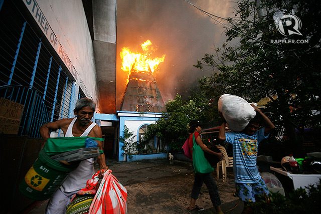 3 dead, thousands lose homes in QC fire on first day of 2015