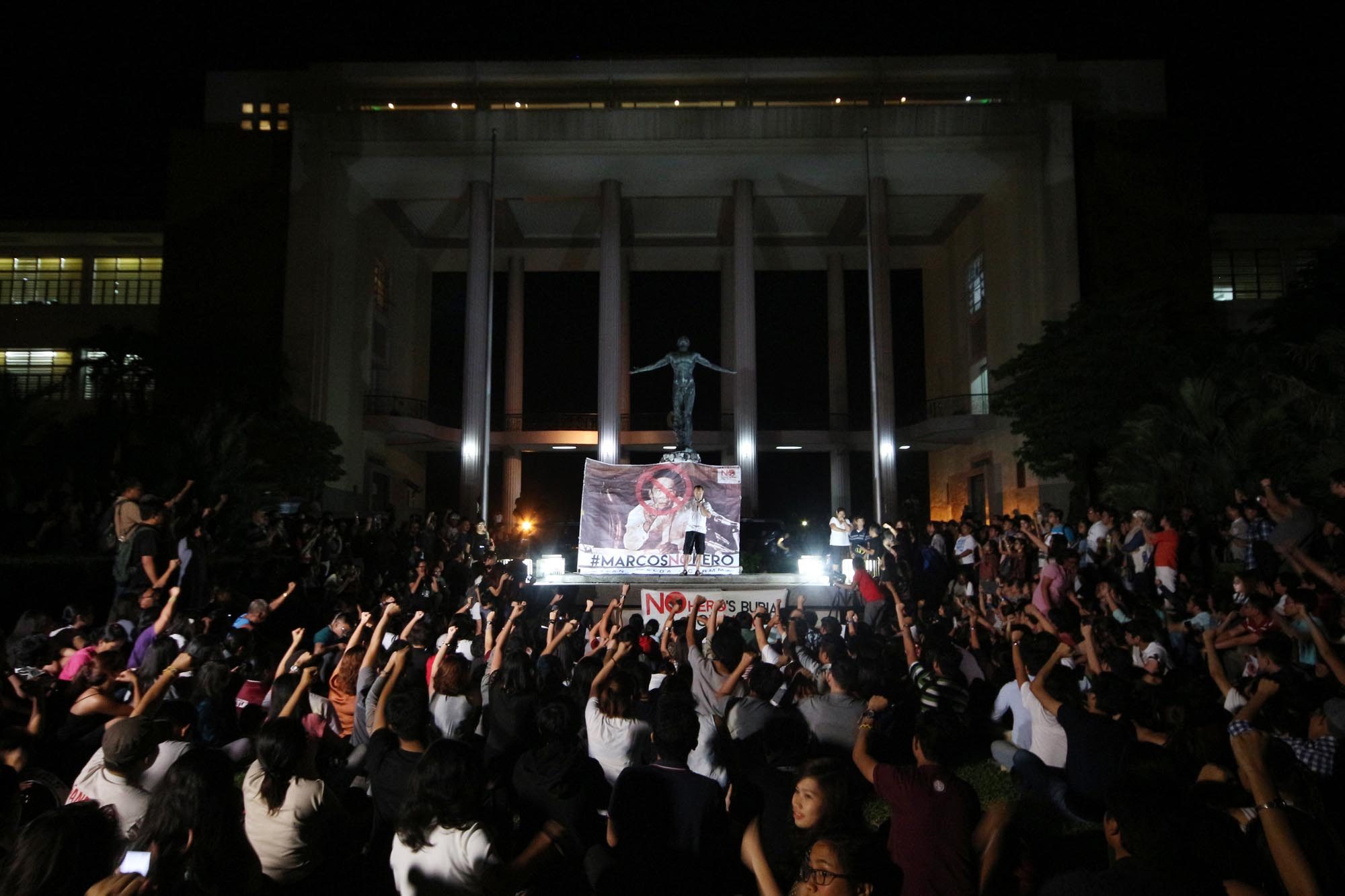 NO TO MARCOS. University of Philippines students join Martial Law Victims in a protest rally at the UP compound on Tuesday to condemn the Supreme Court's decision granting hero's burial to the late President Ferdinand Marcos in the Libingan ng mga Bayani. Photo by Joel Liporada/ Rappler 