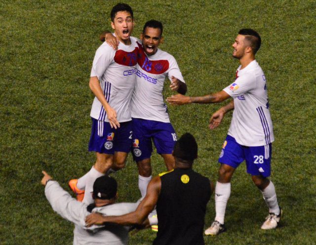 Ceres player Okunaiya (center) celebrates with Christiaens and Reichelt. Photo by Bob Guerrero/Rappler 
