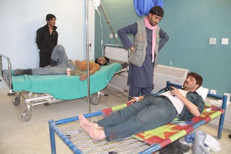 Suicide bombers, gunmen kill 71 in attacks on Afghan security forces