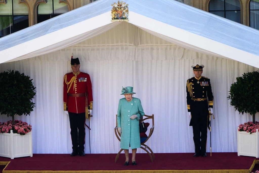 Queen marks official birthday with scaled-back parade at Windsor