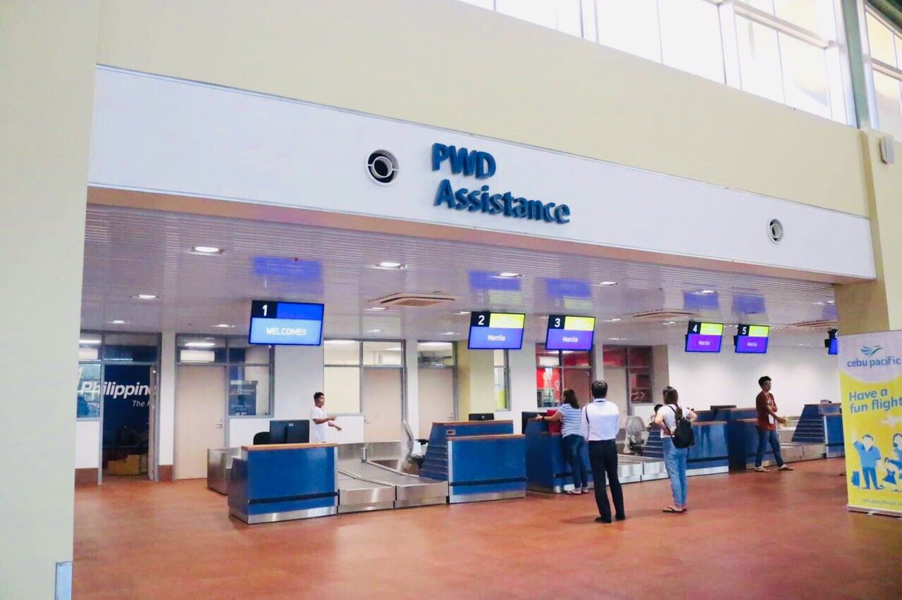 PWD ASSISTANCE. Check-in gates include counters which would provide assistance to persons with disabilities. 