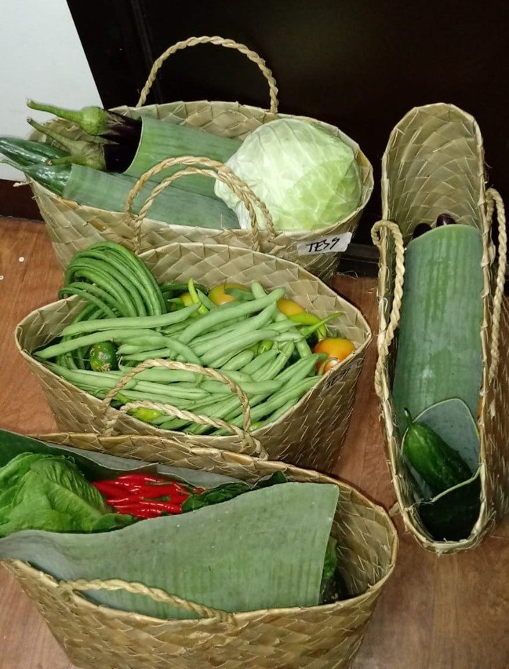 PLASTIC-FREE. BukidFresh uses bayongs and banana leaves to pack fruits and vegetables. Photo courtesy of Maria Aurora Garcia 