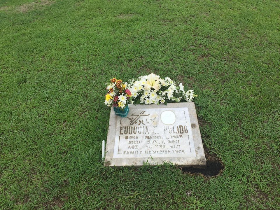 FINAL HOMECOMING. Eudocia Pulido's ashes are buried at a memorial park near the family market. Photo by Lian Buan/Rappler  