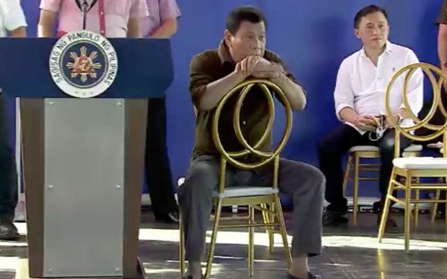 WAITING DUTERTE. While waiting for Ramon Ang, President Duterte chats up the audience. RTVM screenshot 