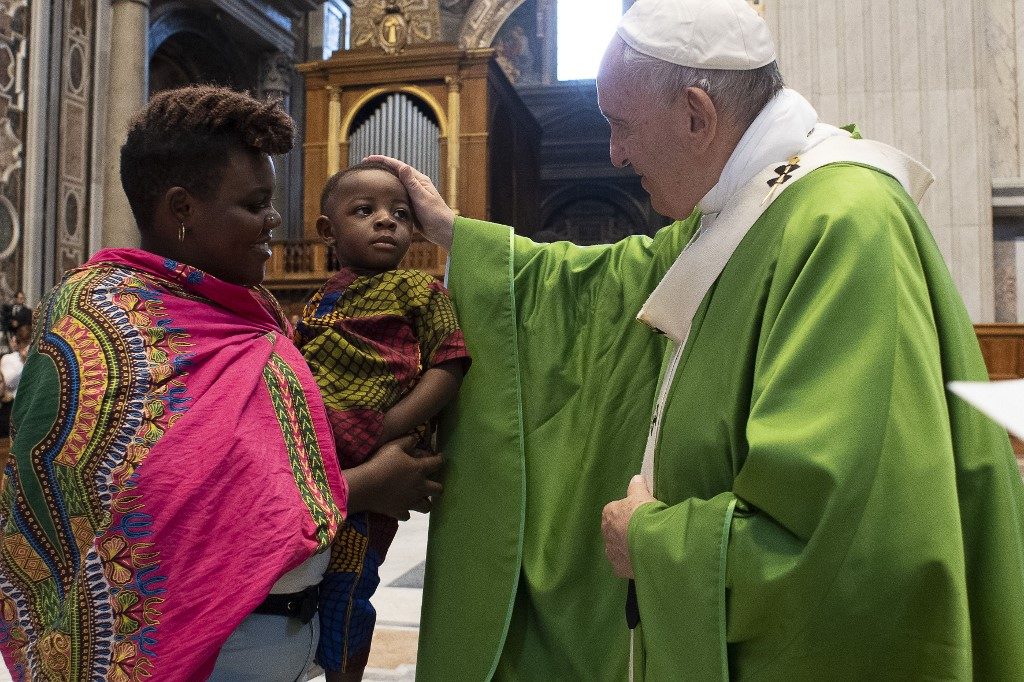 Pope Francis tells migrant mass ‘no one exempt’ from helping
