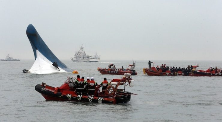 In this file photo, South Korean Coast Guard officers conduct a last-minute rescue operation around the sunken ferry Sewol at sea off Jindo Island in the southwestern province of South Jeolla, South Korea, 16 April 2014. Yonhap/EPA