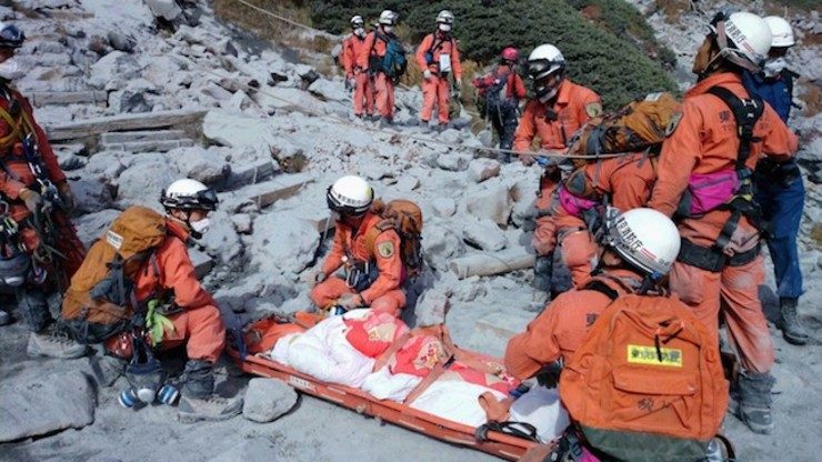 Japan volcano dead found crushed between boulders – report