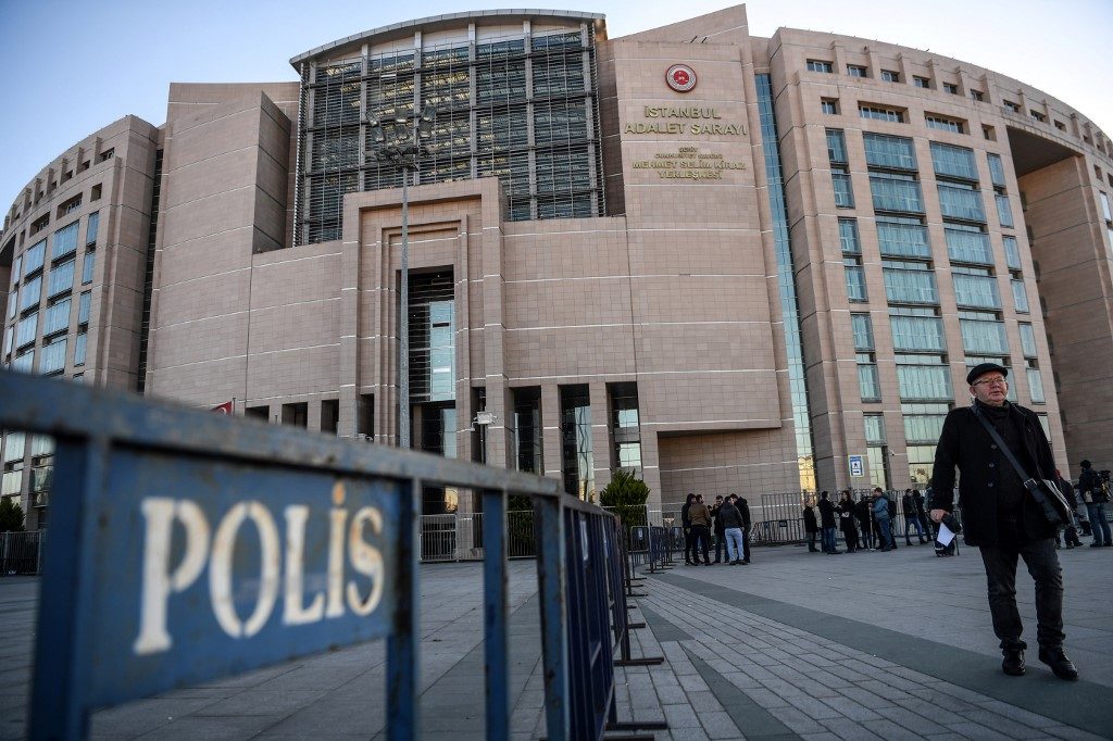Turkey court gives jail terms to opposition journalists