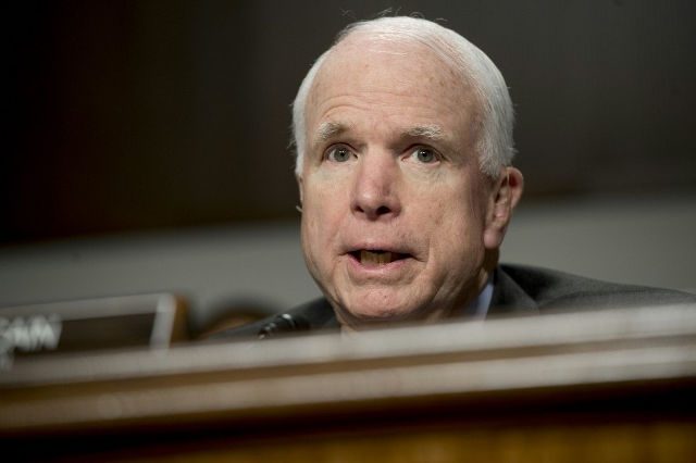 McCain slams Trump for disparaging family of slain soldier