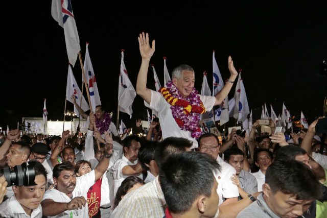 Singapore ruling party stages crushing election win