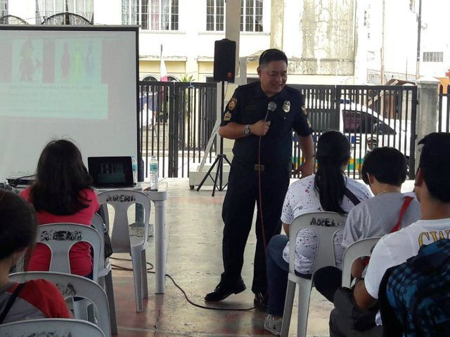 SAFETY FIRST. Senior Fire Officer Ferriols of the San Juan Fire Station teaches youth volunteers on the importance of fire regulations. Image courtesy Bureau of Fire Protection - San Juan City 