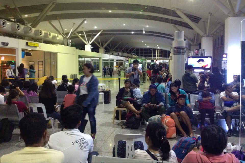 DELAYED. Passengers wait at the departure gate of Iloilo International Airport on August 17, 2018 for their delayed flights. Photo by KD Montenegro 
