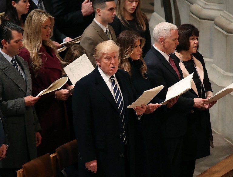 PRAYER SERVICE. US President Donald Trump attends the National Prayer Services with his wife first lady Melania Trump, Vice President Mike Pence, and his wife Karen Pence, at the National Cathedral, on January 21, 2017 in Washington, DC. Mark Wilson/Getty Images/AFP 
