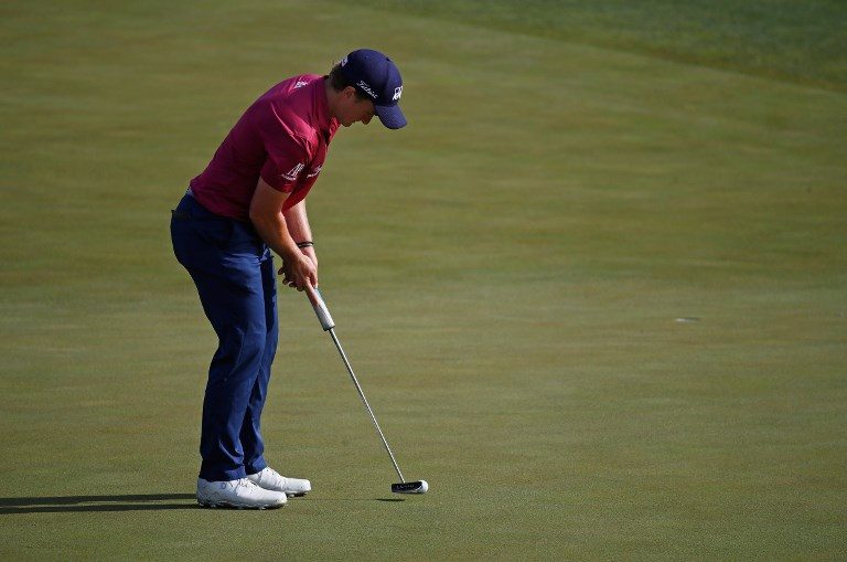 Dunne holds off McIlroy to win British Masters