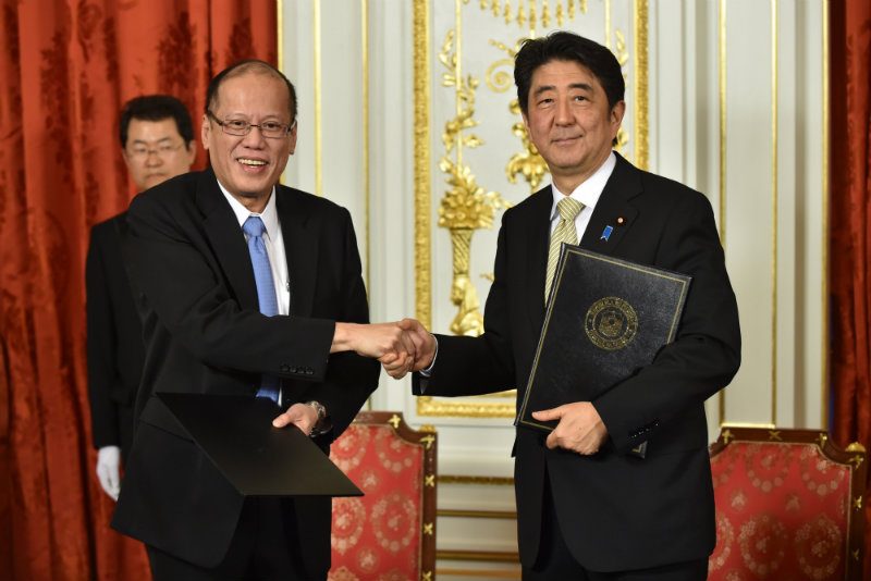 'A FRIENDSHIP OF TWO SUNS.' Philippine President Benigno Aquino (L) shakes hands with Japan's Prime Minister Shinzo Abe at the Akasaka State Guesthouse in Tokyo on June 4, 2015. Photo by Kazuhiro Nogi/EPA 