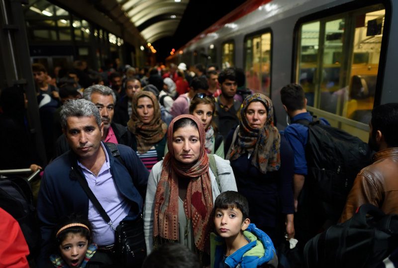 German industries make economic case to welcome refugees