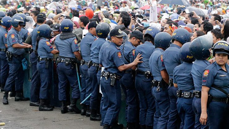 Philippine police arrest 3 for bomb joke during papal mass