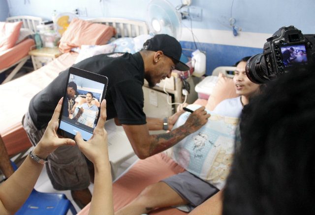 Calvin Abueva visits a Heroes' Ward with the rest of the PBA All-Stars before falling sick. Photo from PBA Images  