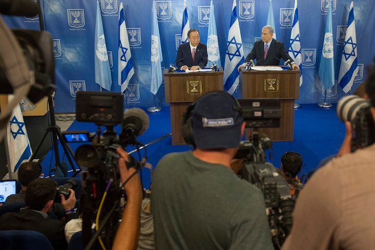 'STOP FIGHTING' UN Secretary-General Ban Ki-moon (left) speaks to the press in Jerusalem after a meeting with Israeli Prime Minister Benjamin Netanyahu (right) in Tel Aviv, Israel, 22 July 2014. Eskinder Debebe/UN Photo