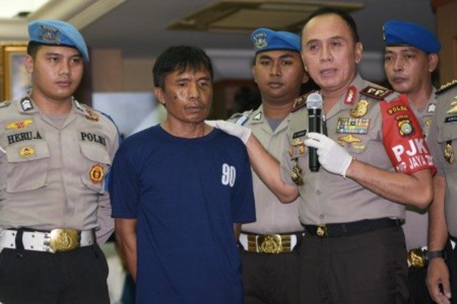 Tersangka Ridwan Sitorus alias Ius Pane (kedua kiri) dalam rilis kasus Pulomas di Polda Metro Jaya, Jakarta, Kamis (5/1). Foto oleh Sigid Kurniawan/ANTARA 