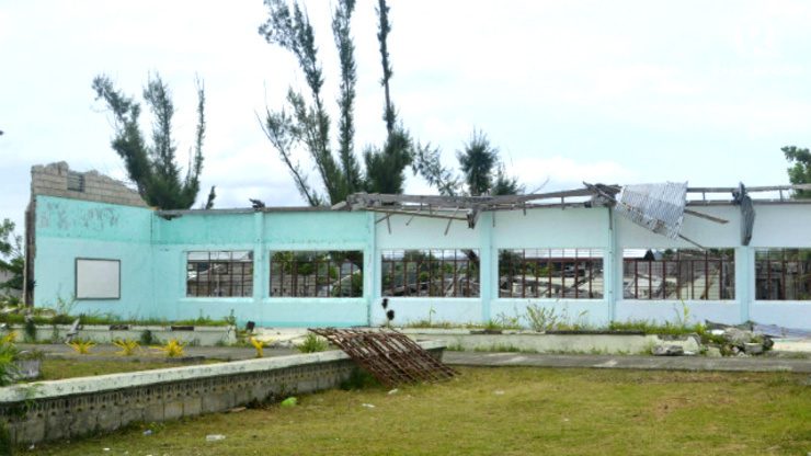 DESTROYED. 90 % of the entire campus was ravaged by Typhoon Yolanda. 