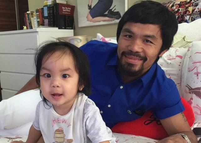 PAC DAD. Manny Pacquiao and son Israel smile for the cameras. Photo from Pacquiao's Instagram 