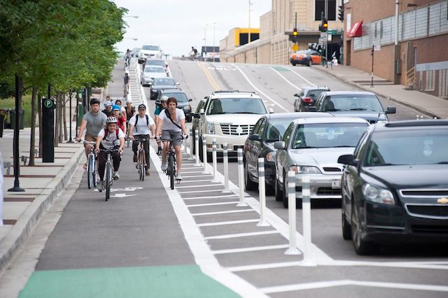 COASTING ALONG CHICAGO. Two-wheeled travel is more fun in a protected bike lane. Photo courtesy of the Chicago Department of Transportation 
