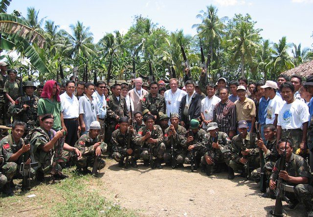 USAID and GEM staff with MNLF commanders. Photo courtesy of Noel Ruiz 