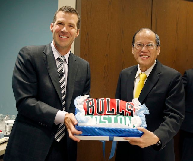 President Benigno S. Aquino III receives signed jerseys of NBA teams from James Peck, CEO and President of Transunion after his meeting with business organizations in Chicago, on May 6, 2015. Photo by Gil Nartea/Malacañang Photo Bureau    