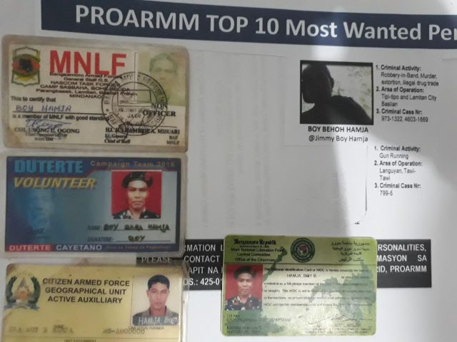 MOST WANTED. Identification cards for Boy Hamja. Photo by Richard Falcatan/Rappler. 