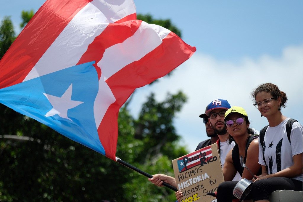 Puerto Ricans celebrate after governor says he will resign