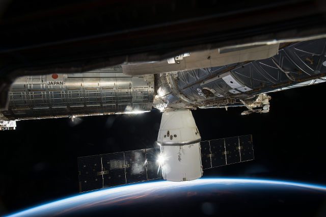 SpaceX cargo arrives at crowded space station