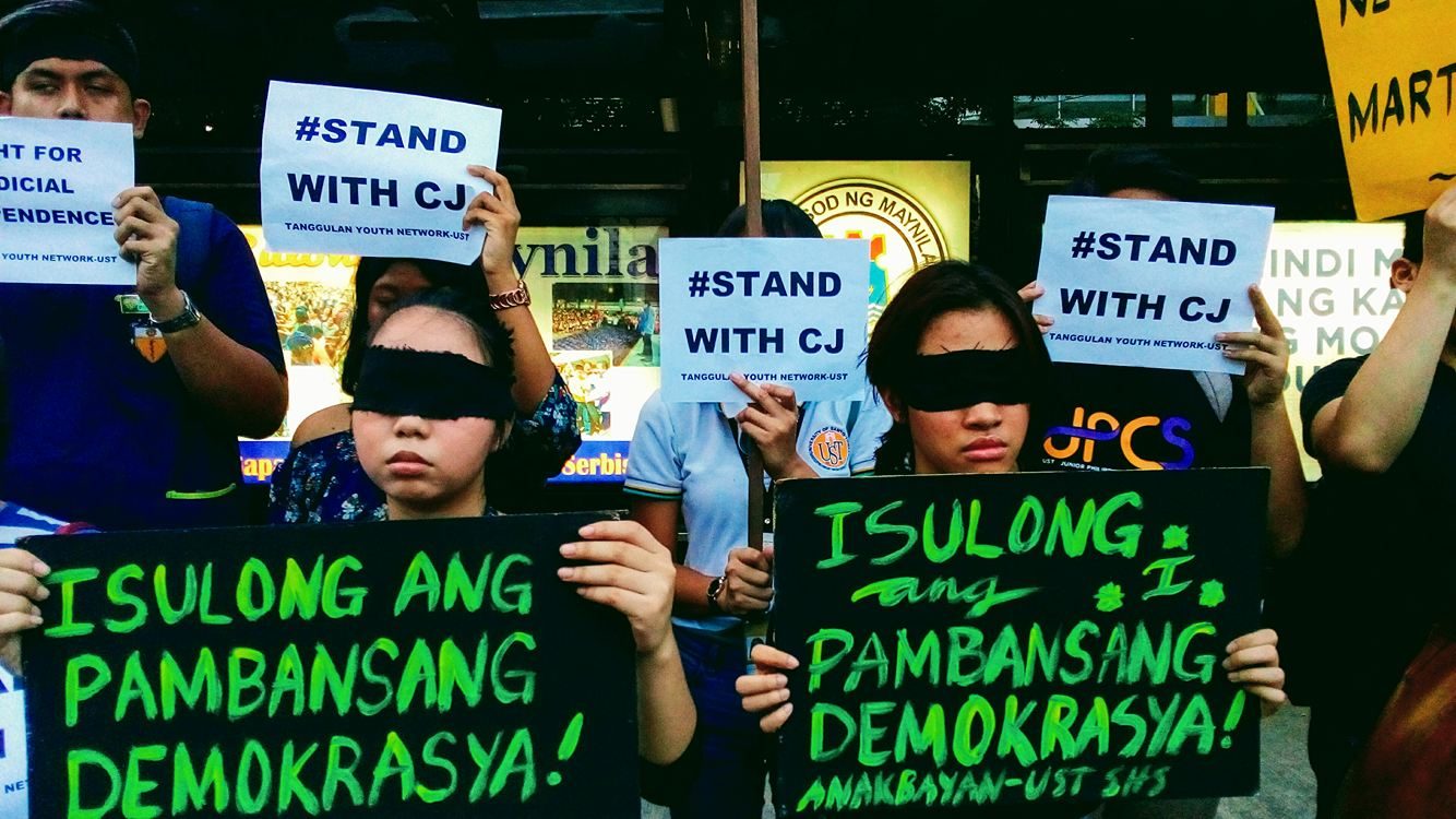 BLINDFOLDED. UST students gather in Espana, Manila in support of th oustered if Justice. Photo by Philip Jamilla 