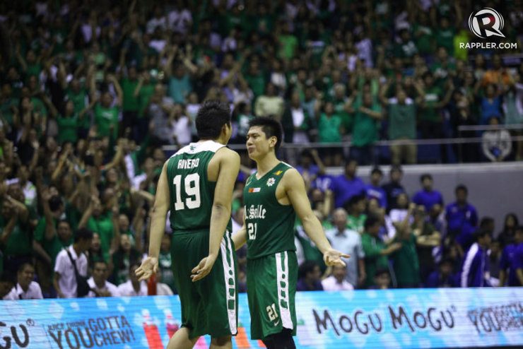 The sea of green erupted behind the Archers' performance. Photo by Josh Albelda