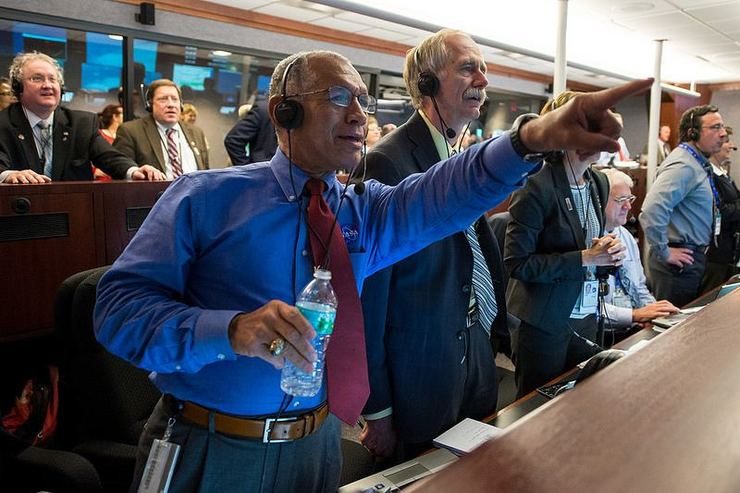 EXCITEMENT. NASA Administrator Charles Bolden and William Gerstenmaier, Associate Administrator for NASA's Human Exploration and Operations Directorate, and others in Building AE at Cape Canaveral Air Force Station in Florida monitor the Orion spacecraft as it returns to Earth and splashes down in the Pacific Ocean.
Bill Ingalls/NASA