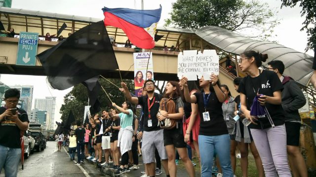 Ateneo de Manila students walk out of classes to reject death penalty bill