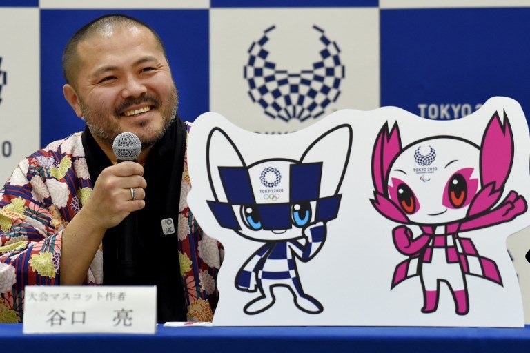 SUPERHEROES. Ryo Taniguchi, winning designer of the official mascots for the 2020 Olympics and Paralympics Games, answers questions during a press conference at an elementary school in Tokyo on February 28, 2018. Toru Yamanaka / AFP 