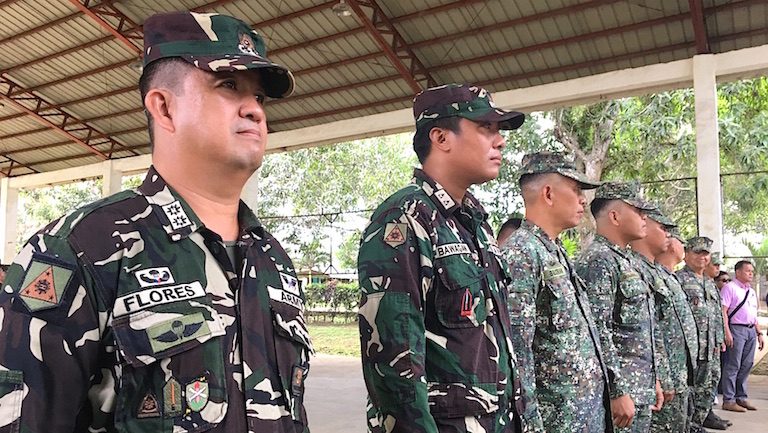 GOLD CROSS MEDAL. Lieutenant Colonel Ramon Flores leads the awardees in Sulu on Tuesday. Rappler photo  