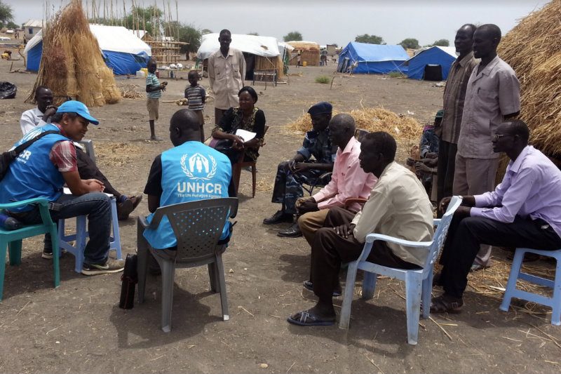 DEPLOYED. Alvarico speaks with internally displaced families in Melut Camp in South Sudan. 