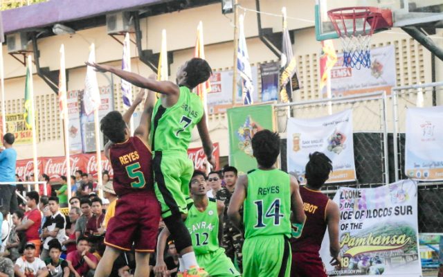 BLOCKED. Joshua Reyes of Davao Region (5) tries to shoot a floater against the defense of Carlo Bringas (7) of Cagayan Valley. 